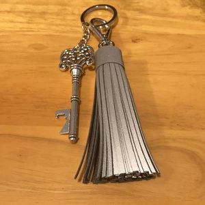 Keychain with reflective tassel and key charm